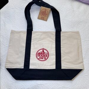 Trader Joe's Canvas Tote Bag in Navy with embroidered red logo.